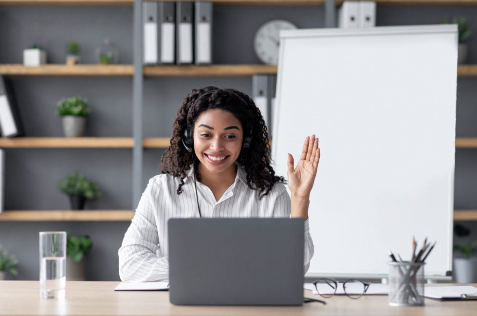 Businesswomen Responding To Personalized Notification 980x649