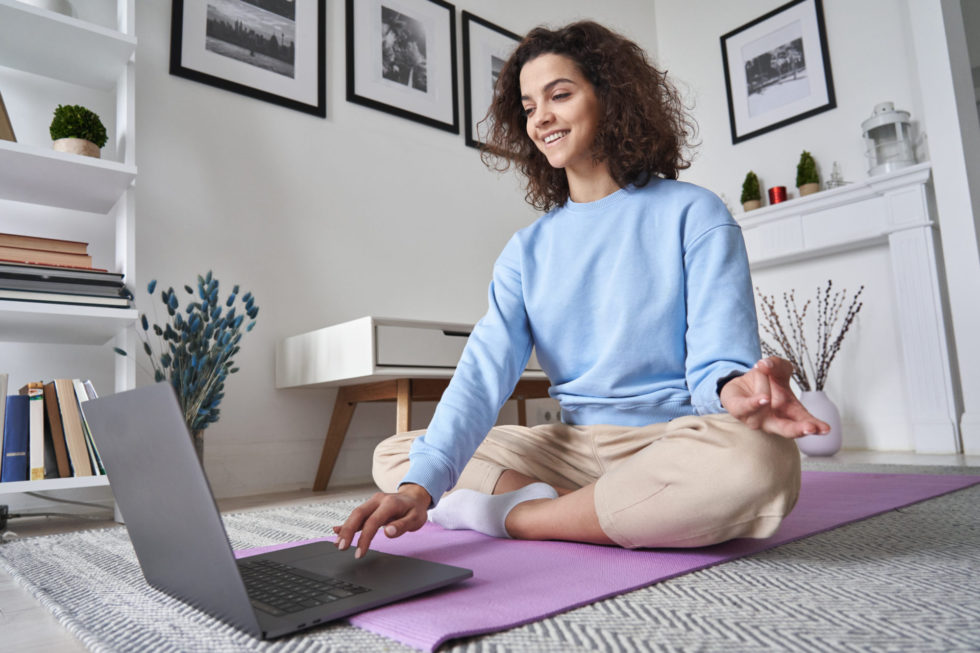 Young Business Women Participating In A Virtual Meditation Session. 980x653